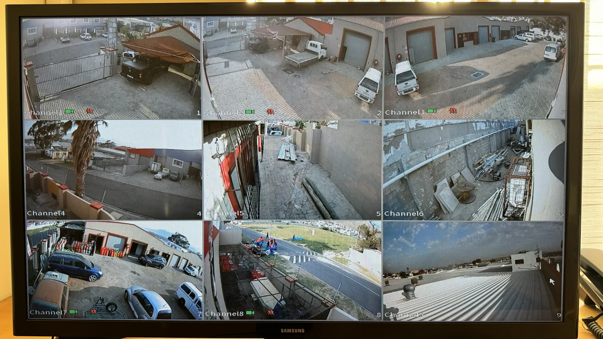 The park's security camera screen, showing views of the yard and entrance