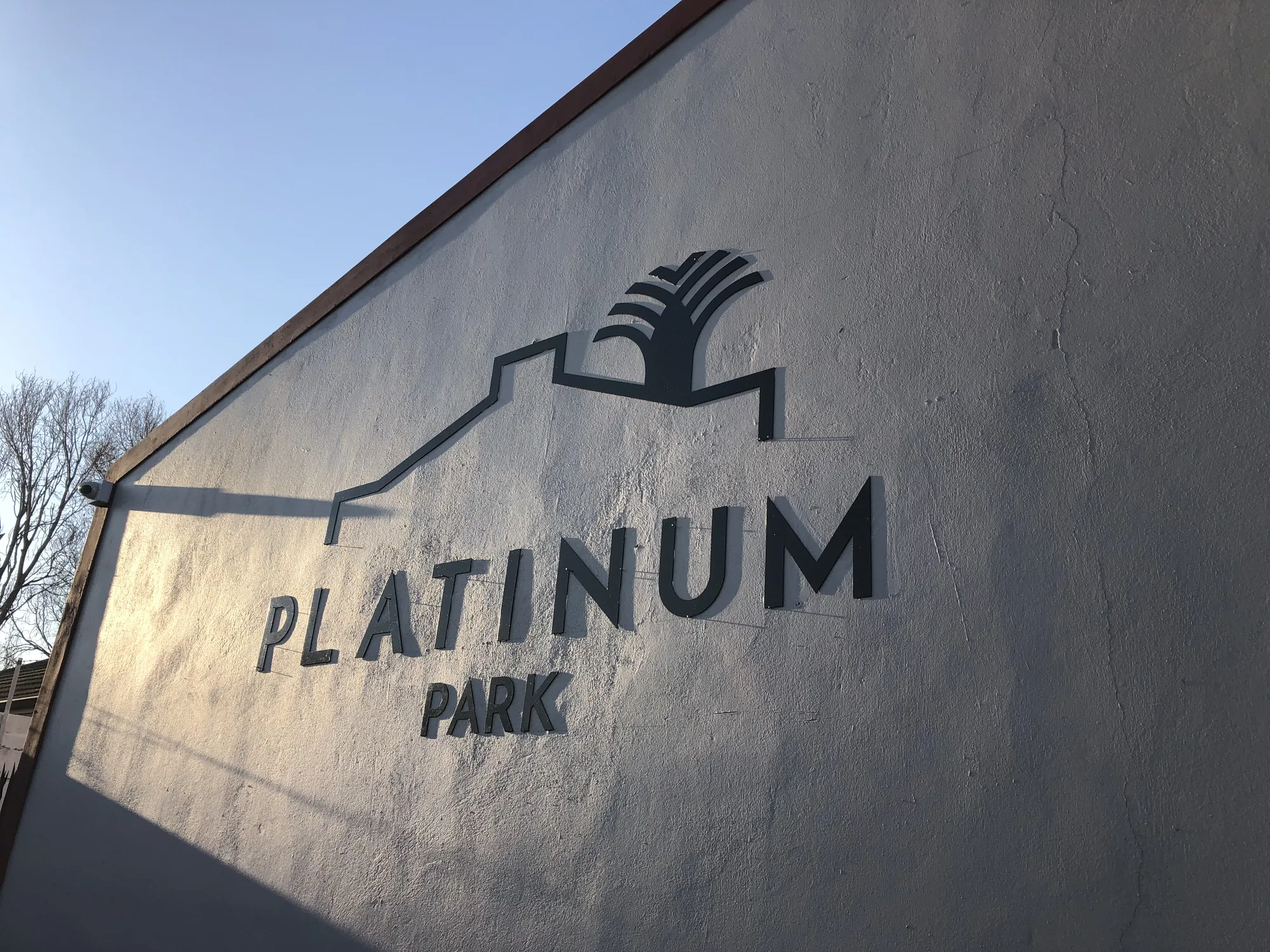 The Platinum Park sign on a gable wall